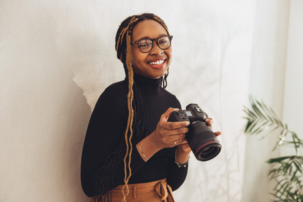 Happy young photographer